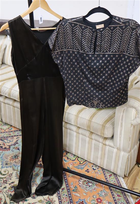 An Egyptian metal and net top and a black all-in-one trousers (2)